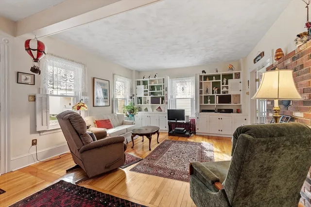 a living room with furniture or couch and a window