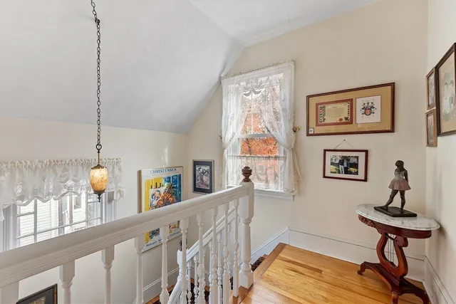 a view of a living room and dining room