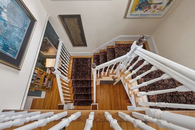 a view of entryway with wooden floor