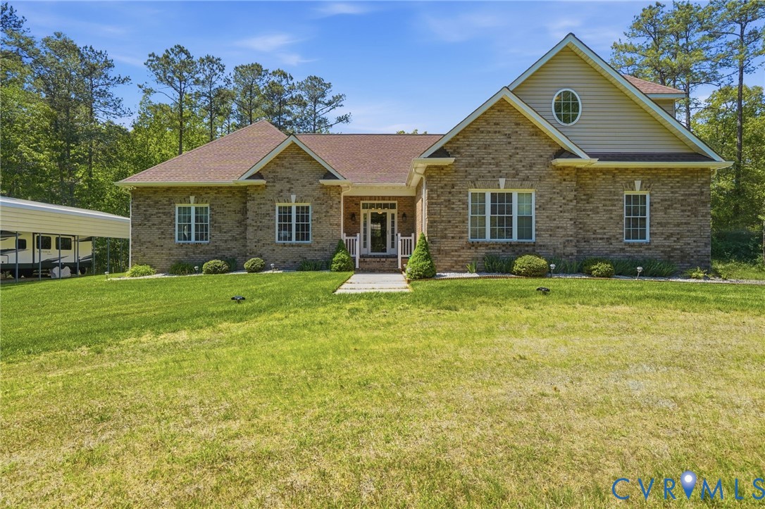 3600 Market Road Mechanicsville, VA 23111 - Photo 61 of 67 a front view of a house with garden