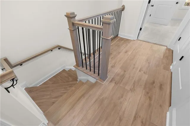a bathroom with a double vanity sink mirror and