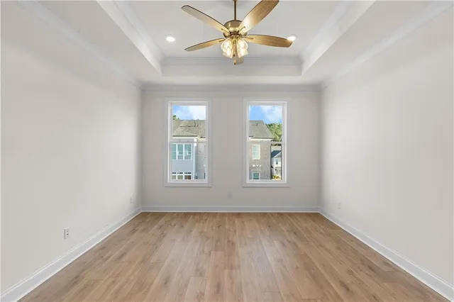 a bathroom with a tub a sink and mirror