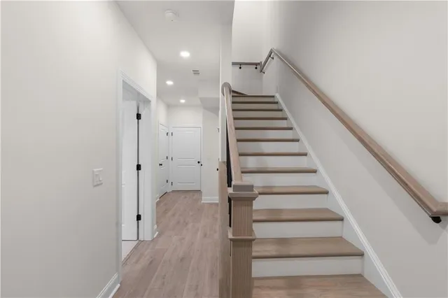 a view of backyard with swimming pool and outdoor seating
