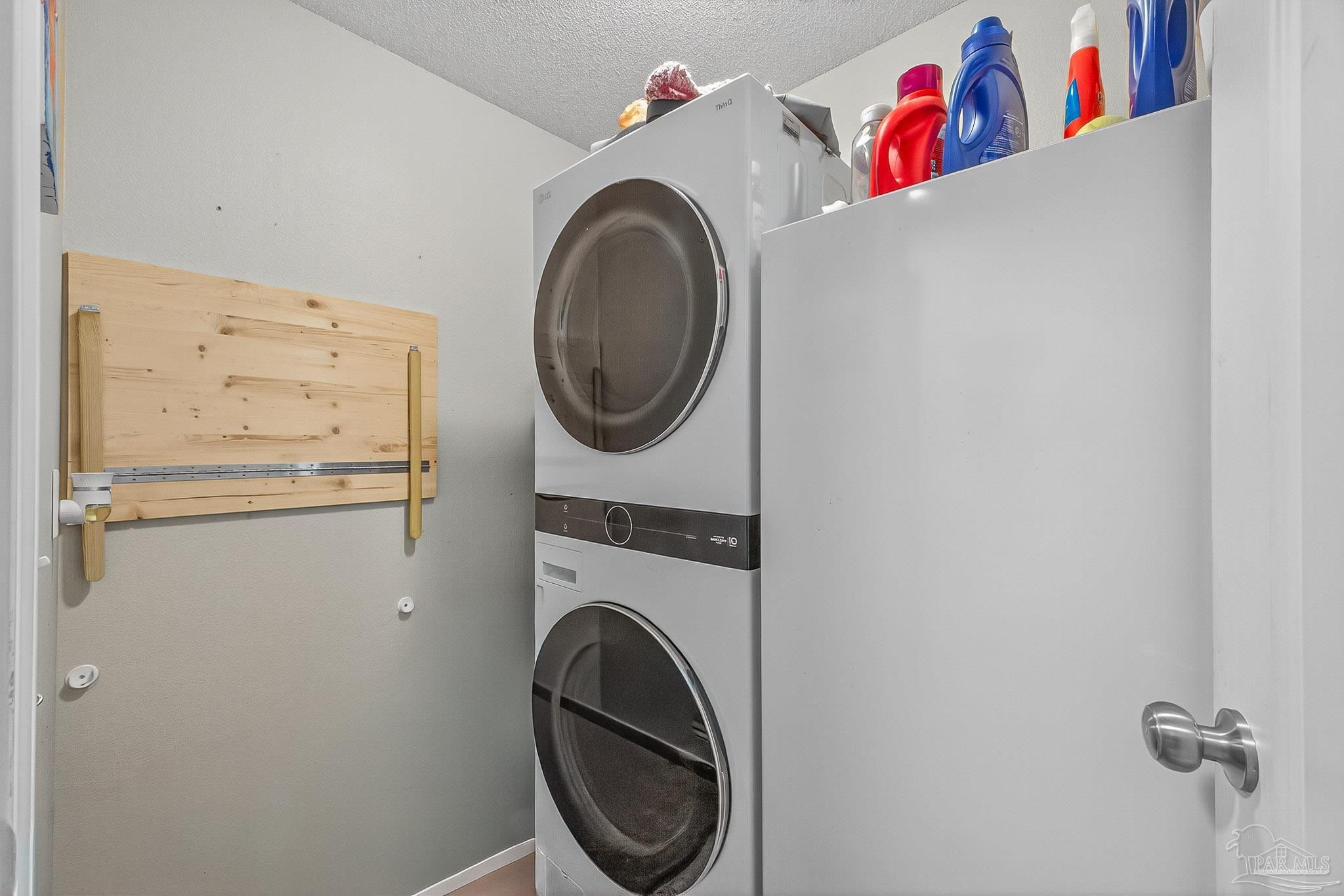 5361 Willard Norris Road Milton, FL 32570 - Photo 20 of 51 a utility room with dryer and washer