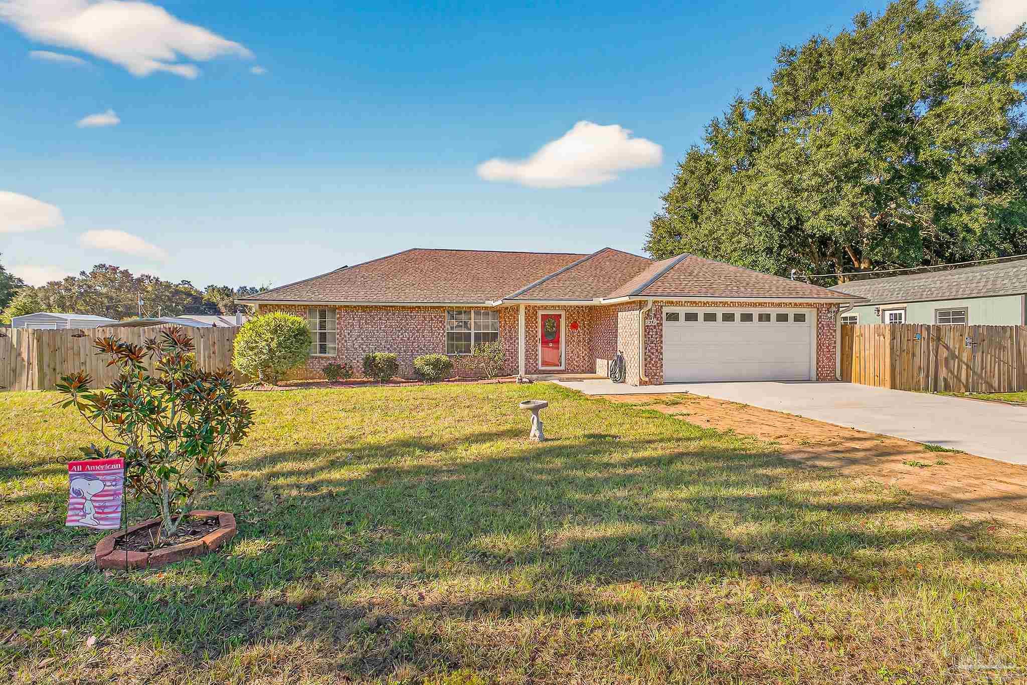 5361 Willard Norris Road Milton, FL 32570 - Photo 2 of 51 a view of a house with a swimming pool