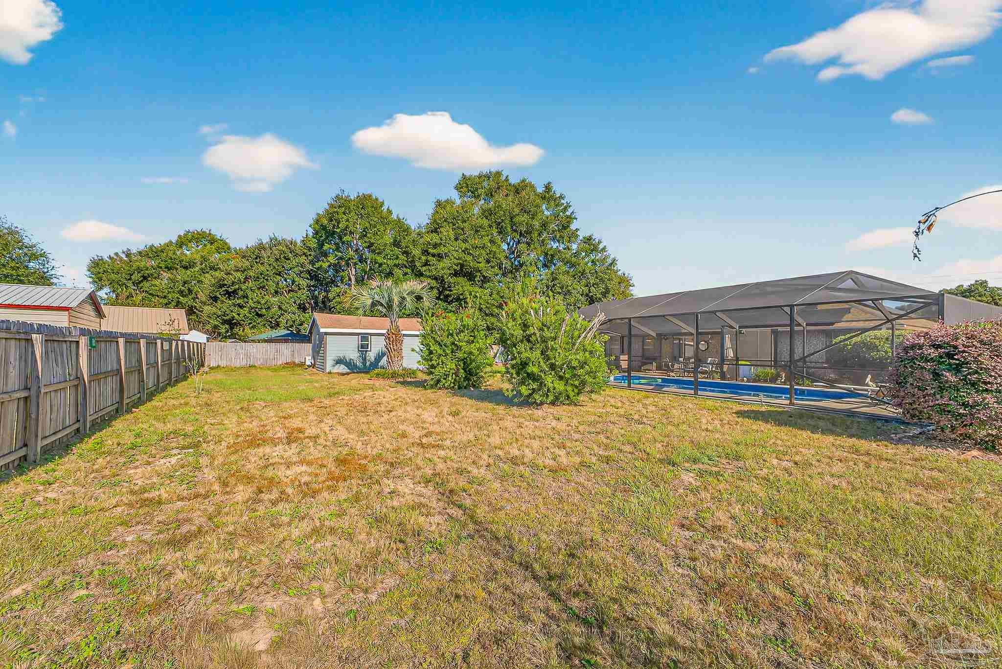 5361 Willard Norris Road Milton, FL 32570 - Photo 47 of 51 a house view with a swimming pool