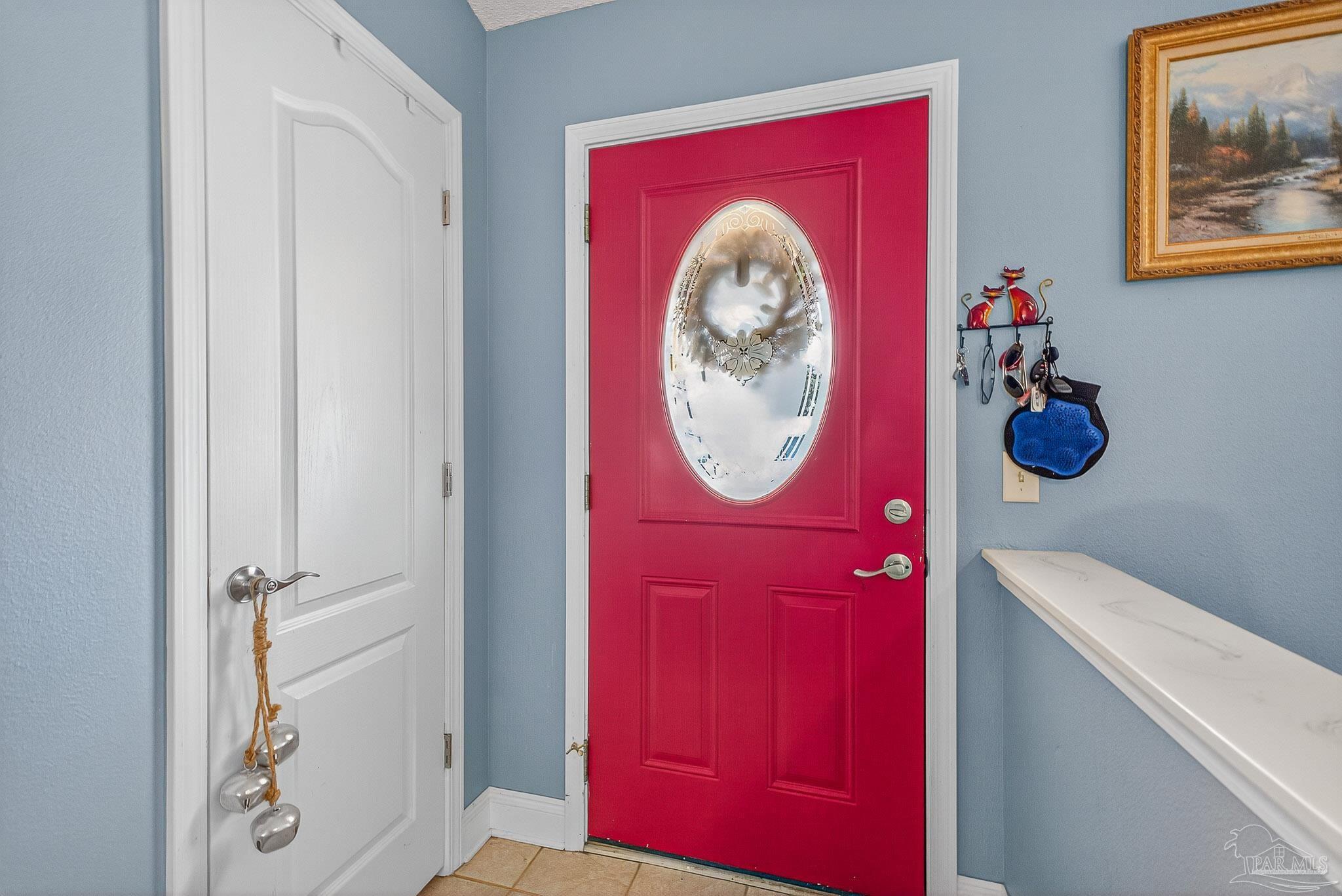 5361 Willard Norris Road Milton, FL 32570 - Photo 5 of 51 a view of a hallway with washer and dryer