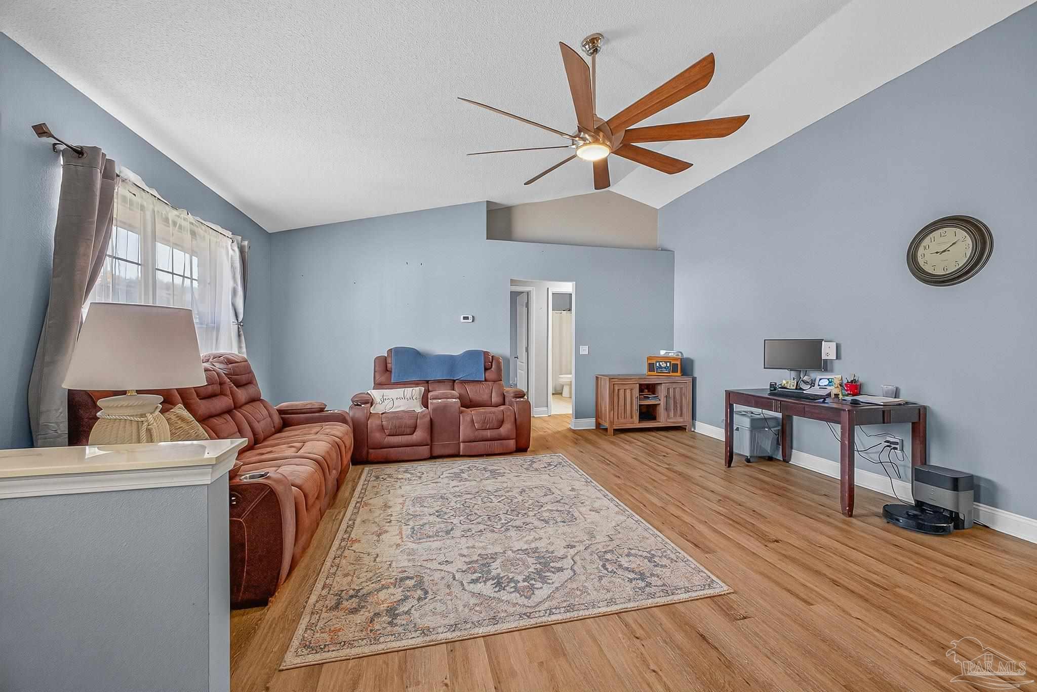 5361 Willard Norris Road Milton, FL 32570 - Photo 7 of 51 a bedroom with furniture and a window