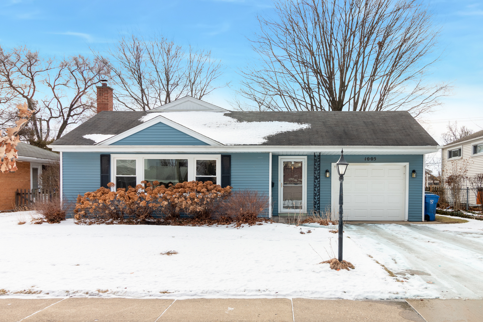 1005 West Pendleton Place Mount Prospect, IL 60056 - Photo 1 of 24 a front view of a house with a yard