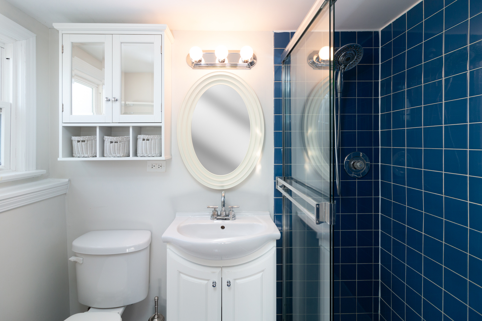 1005 West Pendleton Place Mount Prospect, IL 60056 - Photo 13 of 24 a bathroom with a sink toilet and shower