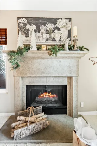 a view of a hallway with wooden floor and door
