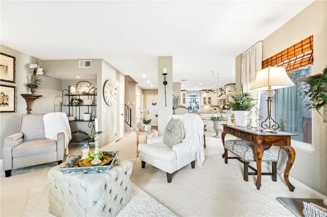 a bathroom with a granite countertop sink mirror vanity and toilet