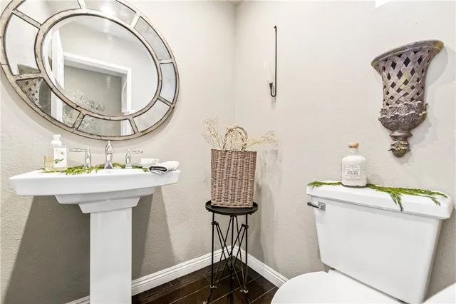 a bath tub sitting next to a white sink