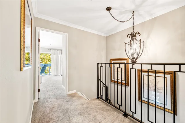 a bedroom with a bed and a lamp on table