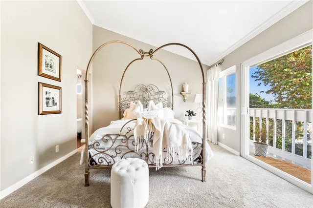 a view of a chair and table in backyard