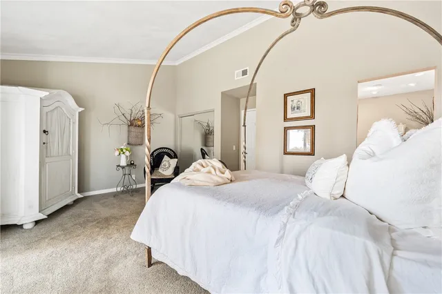 a house with flowers in front of it