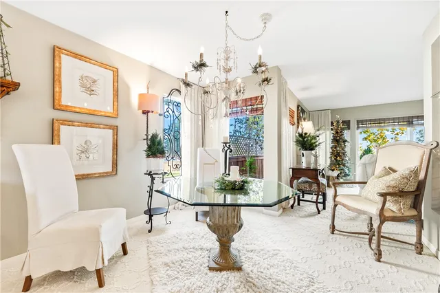 a kitchen with granite countertop a sink and potted plant