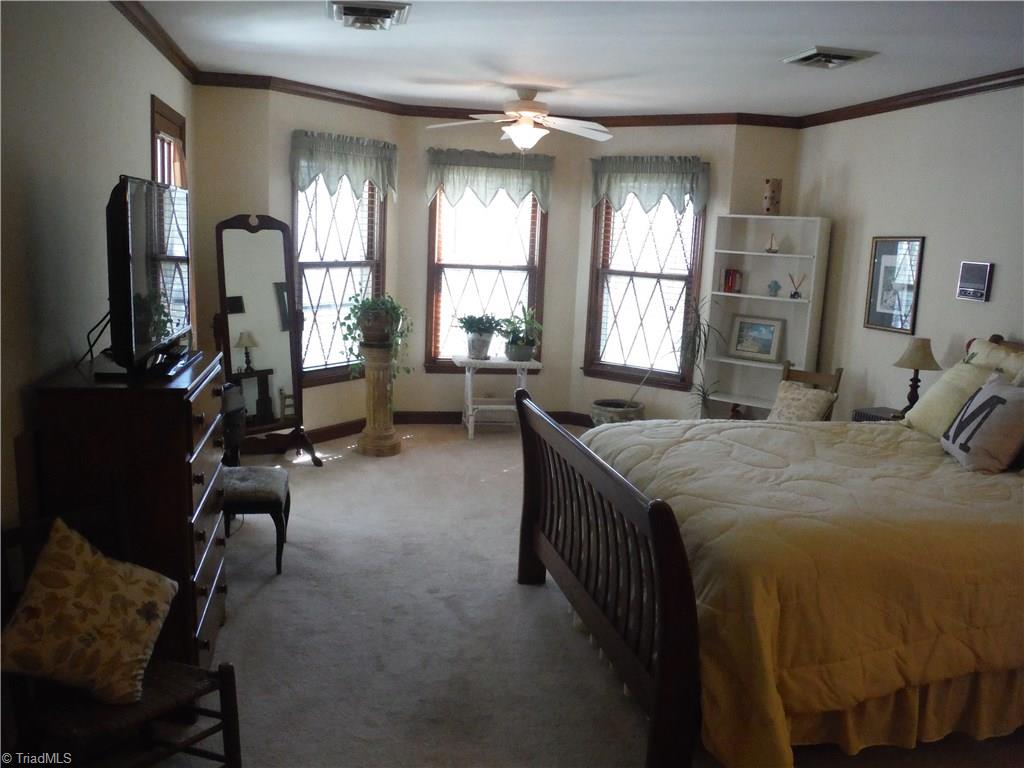 1801 Neelley Road Pleasant Garden, NC 27313 - Photo 12 of 20 Spacious Master bedroom has several windows and access to small balcony outside!