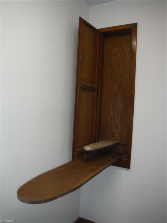 1801 Neelley Road Pleasant Garden, NC 27313 - Photo 17 of 20 Built-in ironing board is nice extra in laundry room!