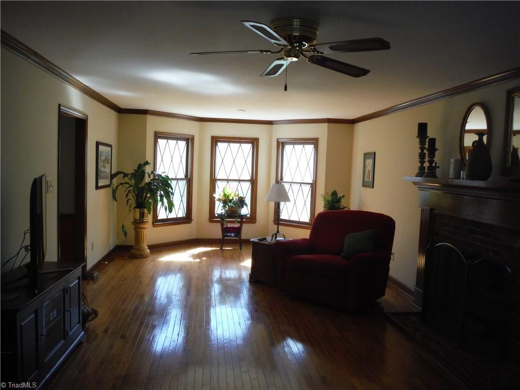 1801 Neelley Road Pleasant Garden, NC 27313 - Photo 4 of 20 Large den has beautiful HDWD floors...