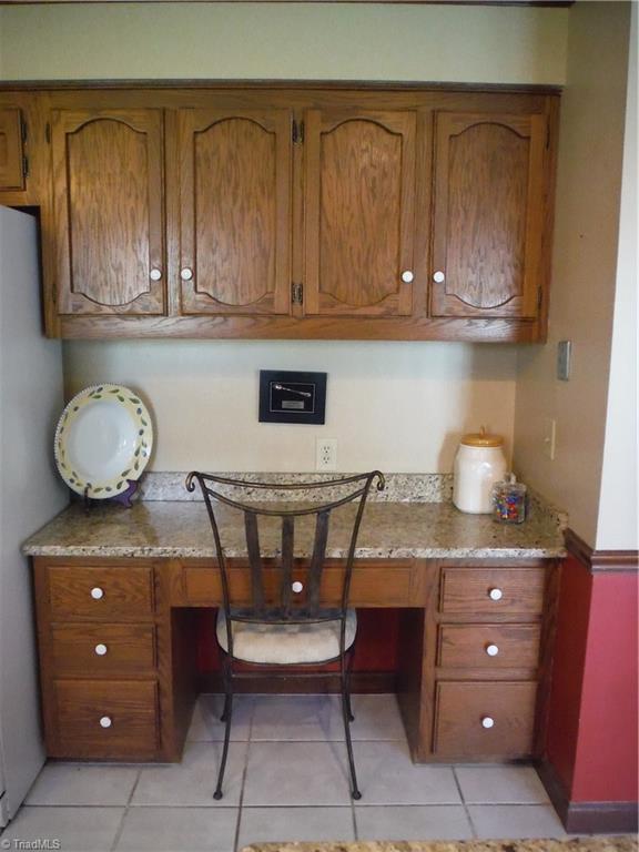 1801 Neelley Road Pleasant Garden, NC 27313 - Photo 7 of 20 Useful built-in desk offers plenty of extra storage!