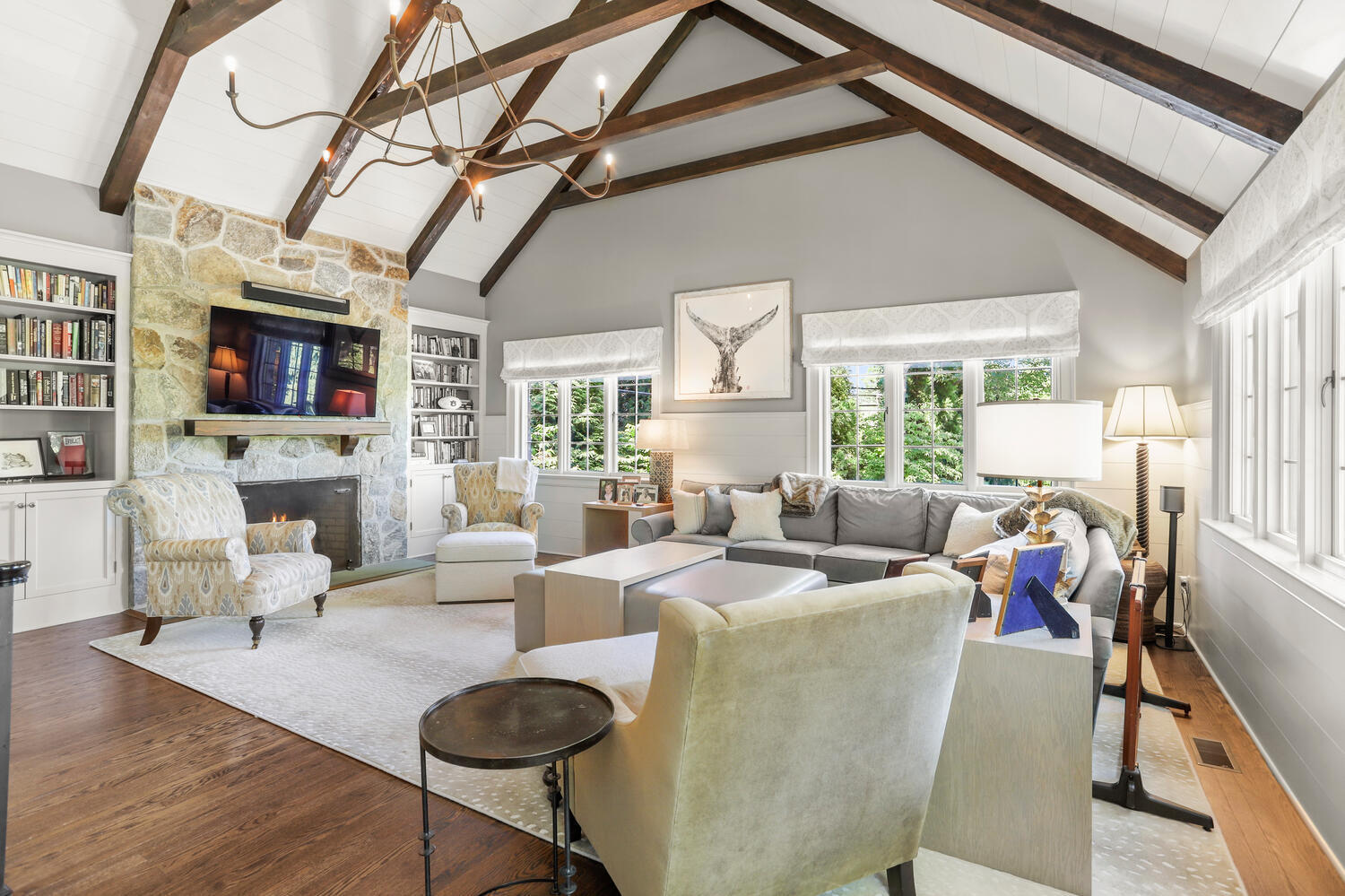 13 Searles Road Darien, CT 06820 - Photo 17 of 35 a living room with fireplace furniture and a large window