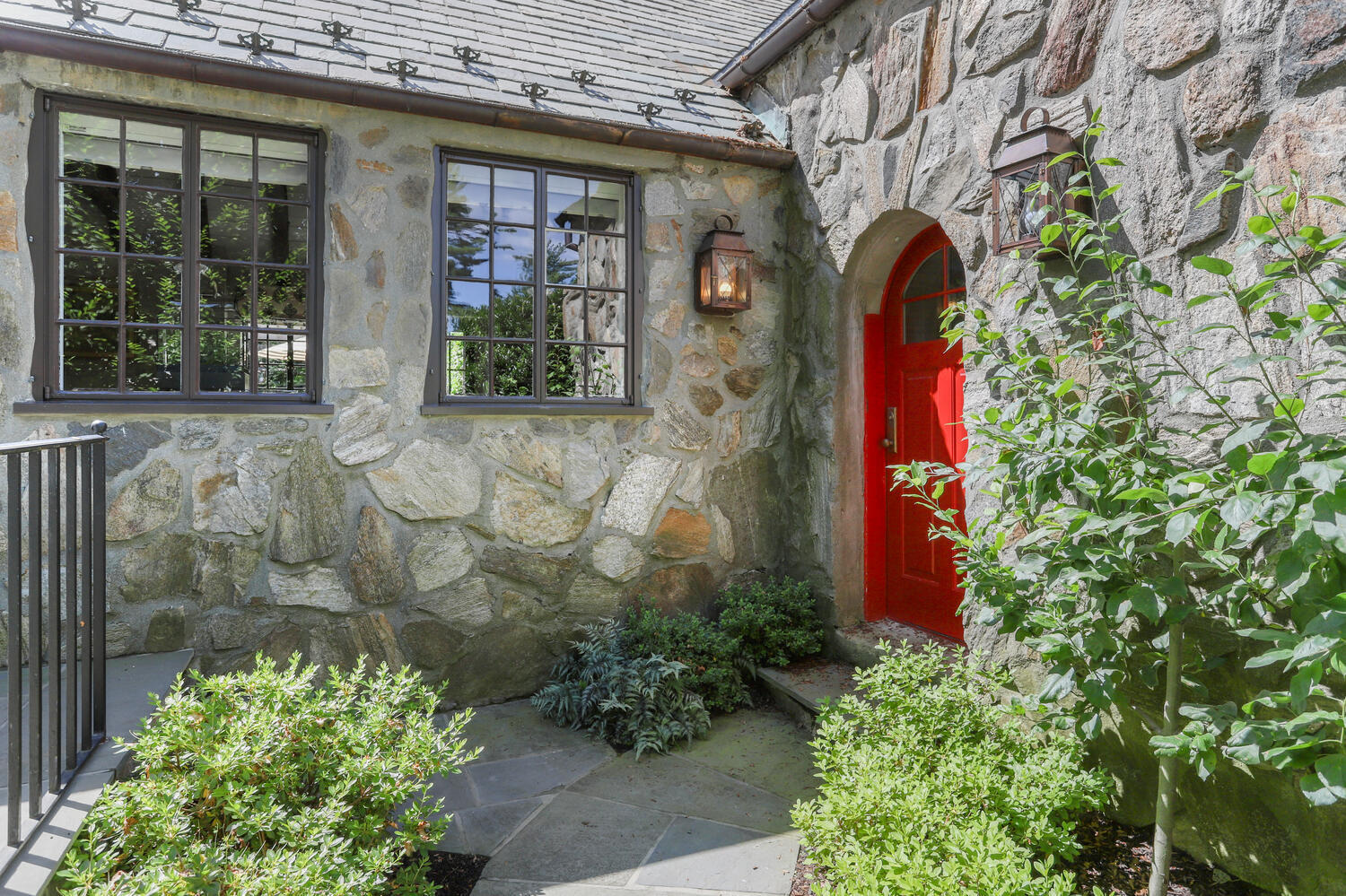 13 Searles Road Darien, CT 06820 - Photo 2 of 35 a front view of a house with a garden