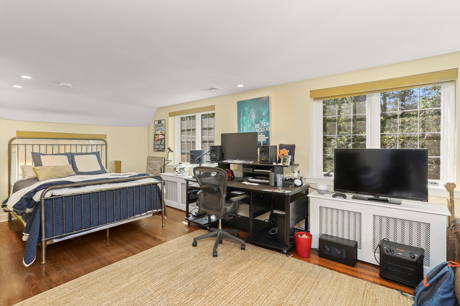 13 Searles Road Darien, CT 06820 - Photo 23 of 35 a bedroom with furniture and a flat screen tv