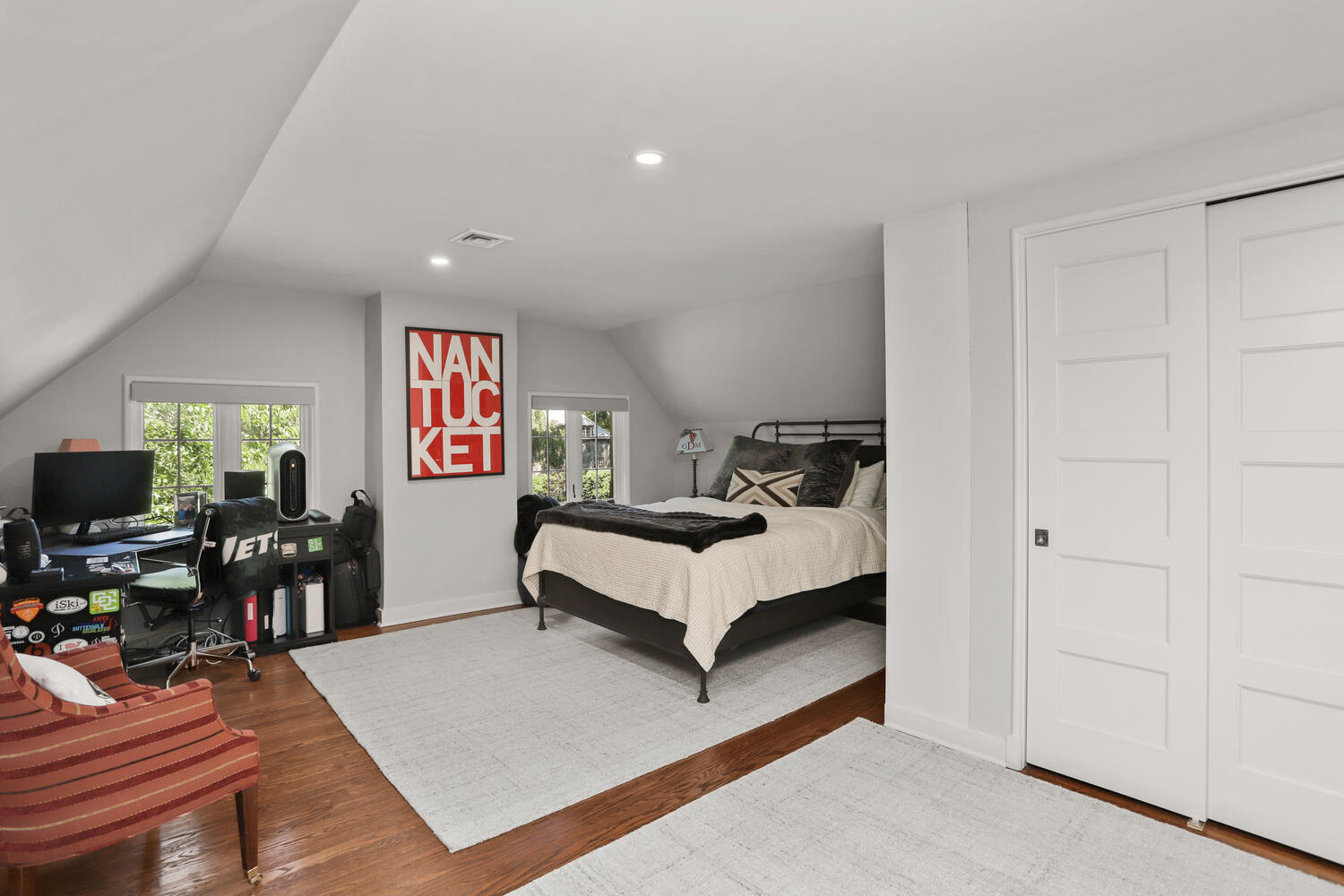 13 Searles Road Darien, CT 06820 - Photo 24 of 35 a bedroom with furniture and a flat screen tv