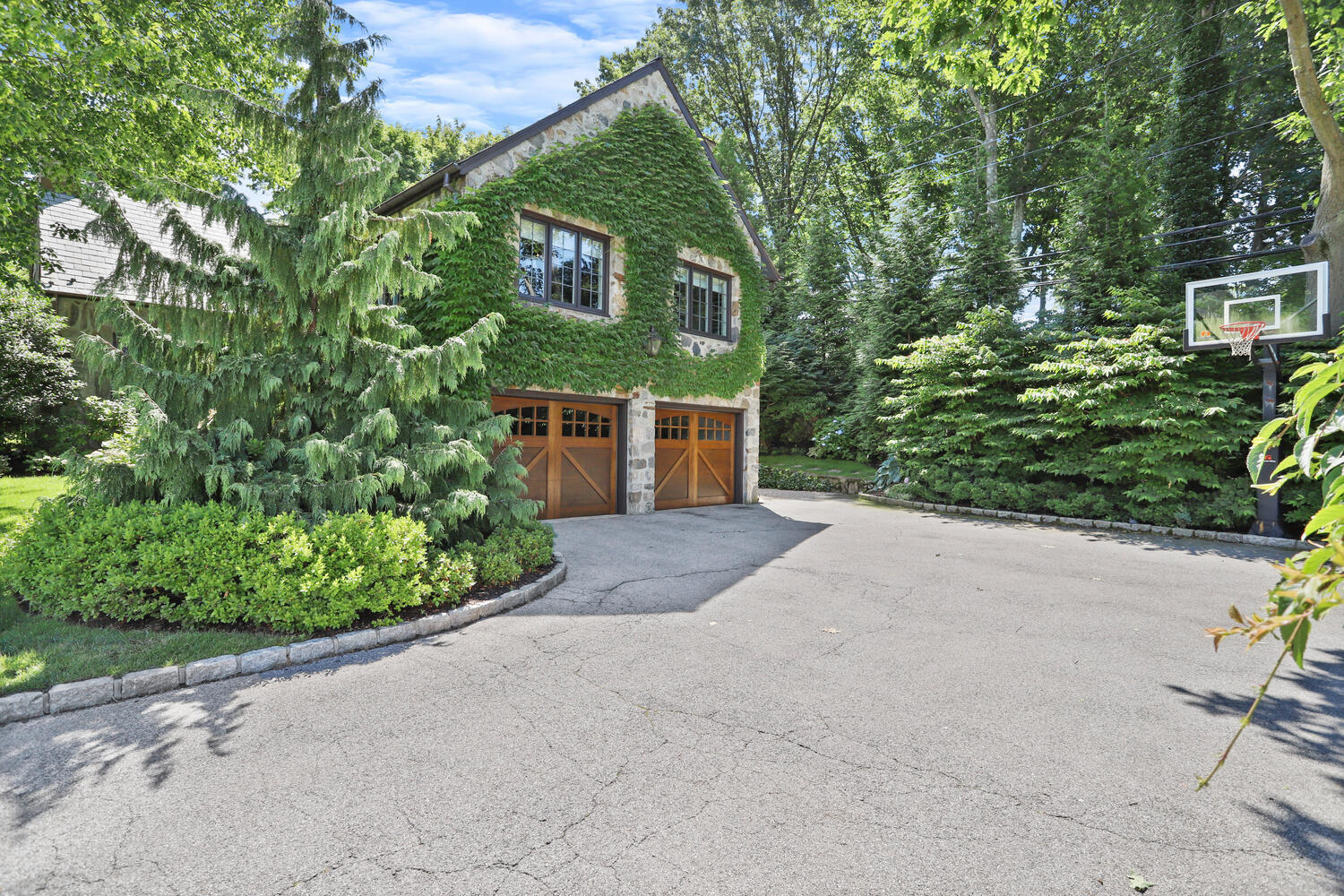 13 Searles Road Darien, CT 06820 - Photo 27 of 35 front view of a house with a garden