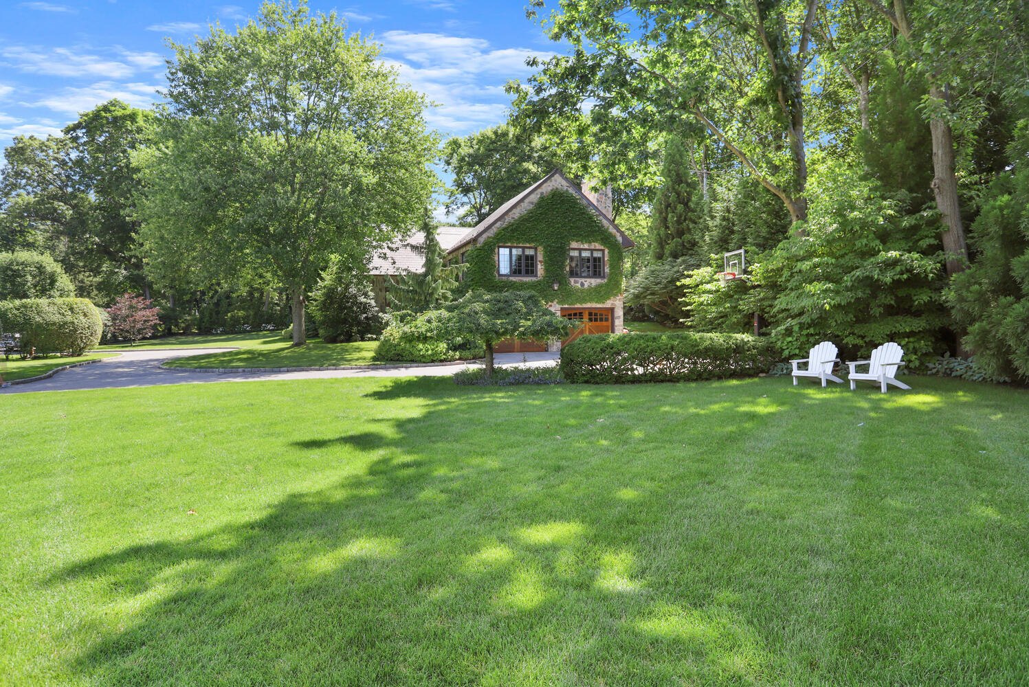 13 Searles Road Darien, CT 06820 - Photo 28 of 35 a front view of a house with a yard