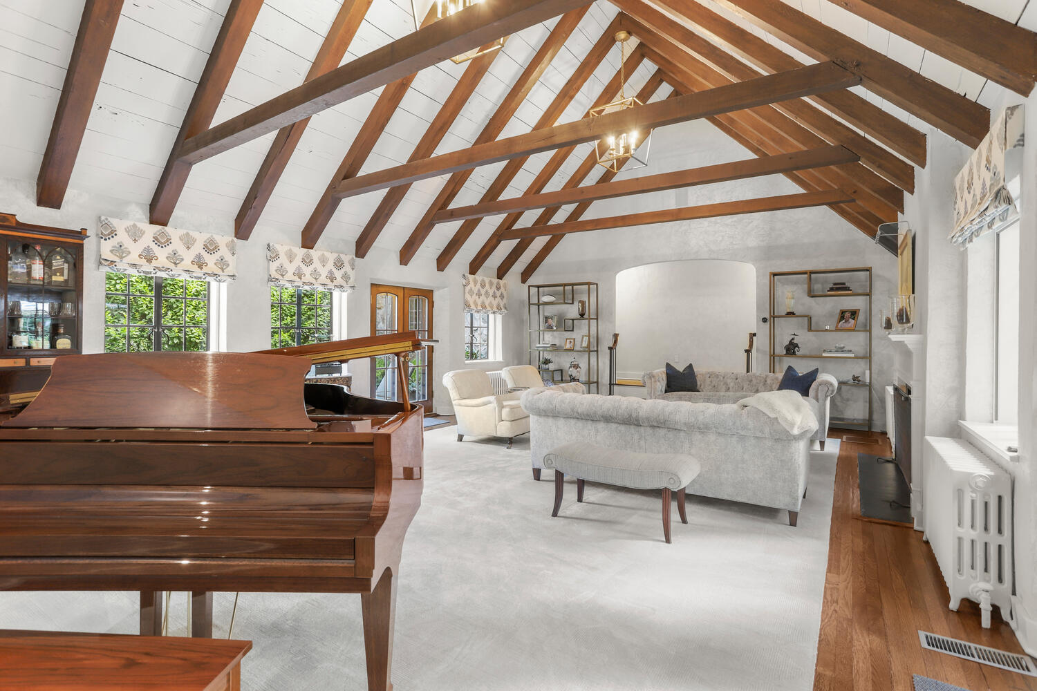 13 Searles Road Darien, CT 06820 - Photo 5 of 35 a living room with furniture and a chandelier