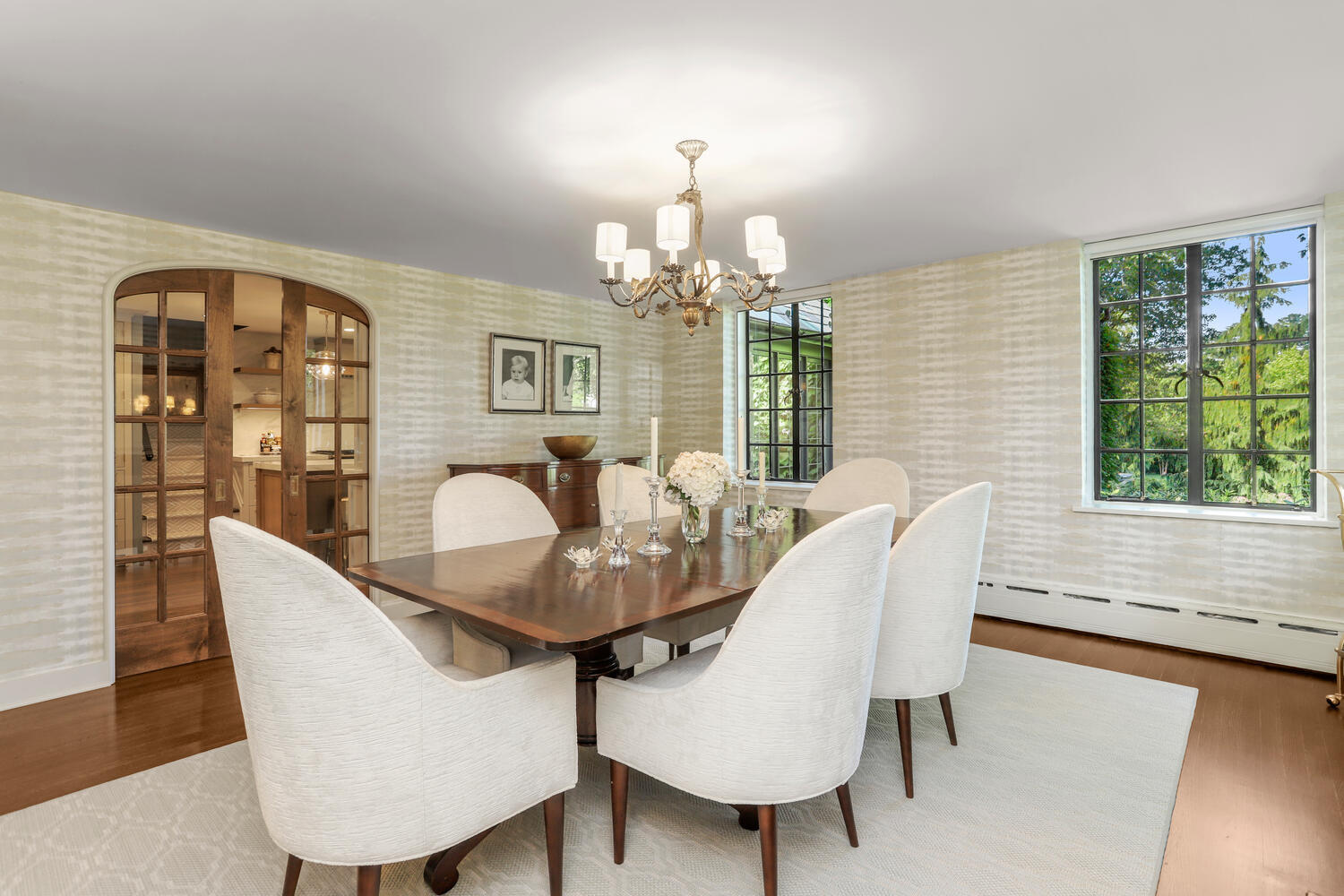13 Searles Road Darien, CT 06820 - Photo 8 of 35 a dining room with furniture a chandelier and wooden floor