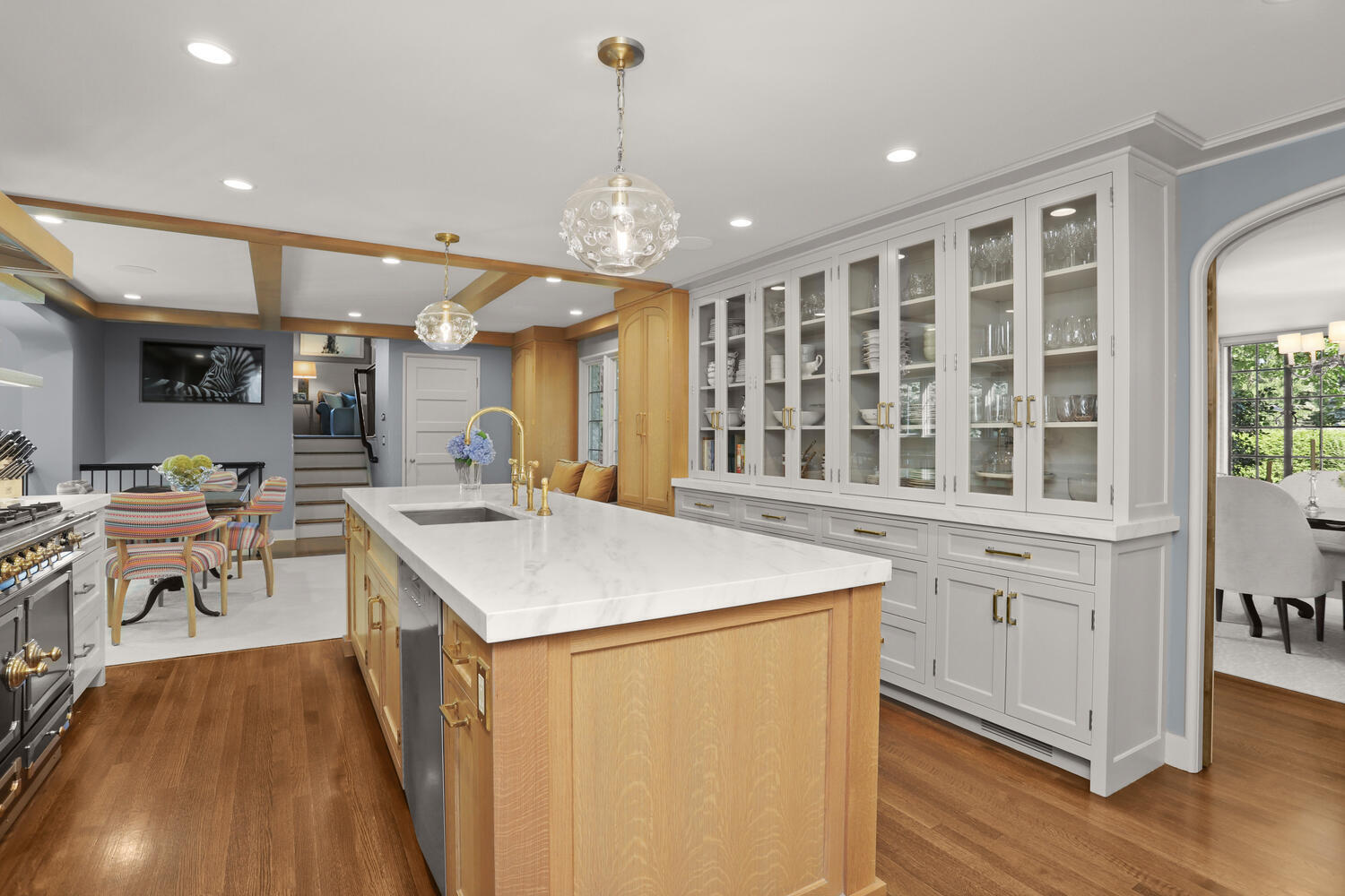 13 Searles Road Darien, CT 06820 - Photo 10 of 35 a kitchen with stainless steel appliances granite countertop a stove and a wooden floors