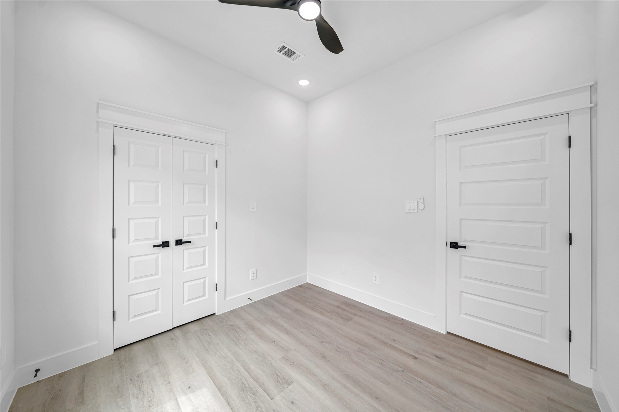 4834 Higgins Street, Unit B Houston, TX 77033 - Photo 23 of 34 wooden floor in an empty room