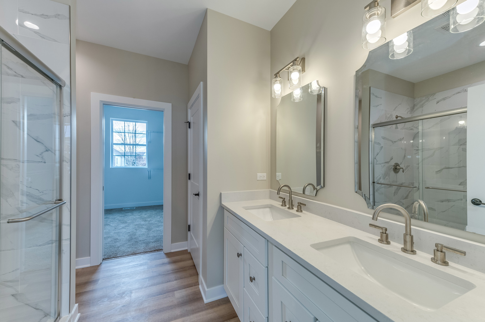 1104 Freedom Road Elburn, IL 60119 - Photo 13 of 24 a bathroom with double vanity sinks and a mirror