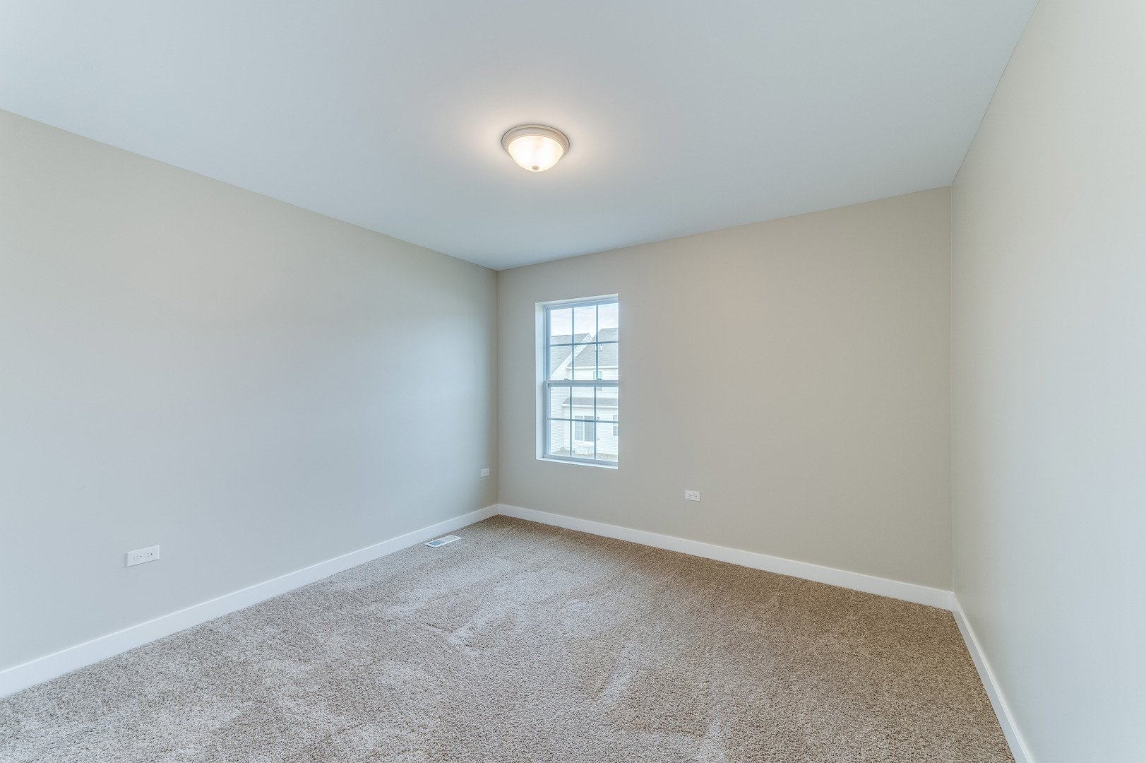 1104 Freedom Road Elburn, IL 60119 - Photo 19 of 24 a view of an empty room with a window