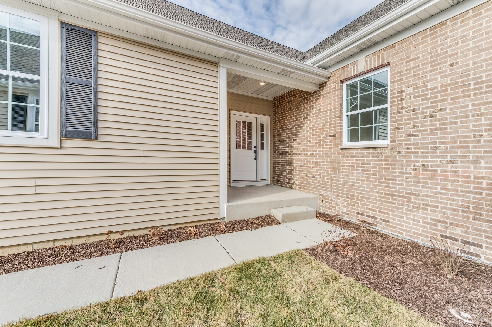 1104 Freedom Road Elburn, IL 60119 - Photo 2 of 24 a front view of a house with a yard