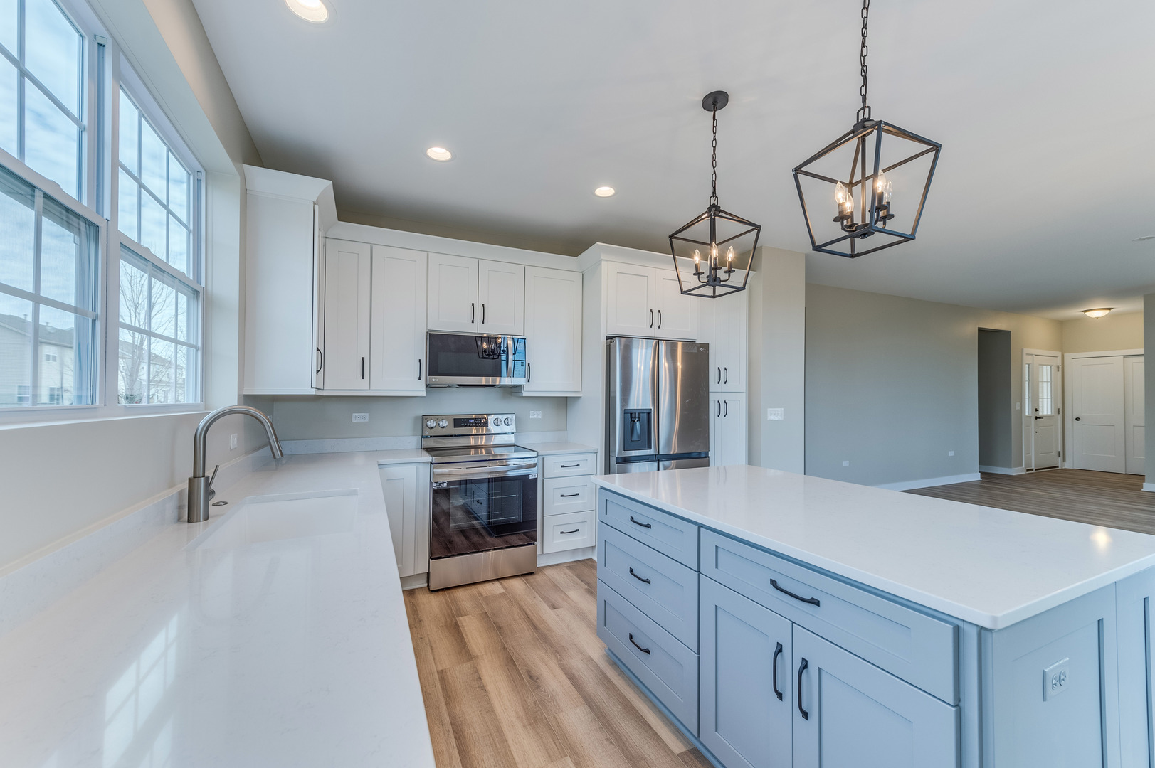 1104 Freedom Road Elburn, IL 60119 - Photo 9 of 24 a kitchen with stainless steel appliances a refrigerator sink and stove