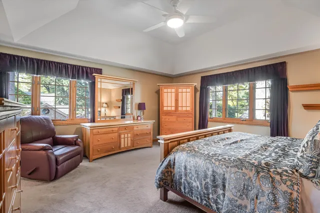 a bathroom with a sink a tub and a mirror
