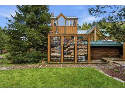 an aerial view of residential house with outdoor space