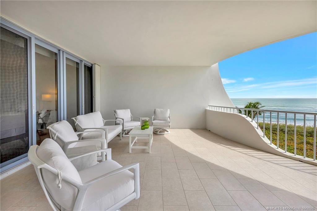 2001 Southeast Sailfish Point Boulevard, Unit 303 Stuart, FL 34996 - Photo 18 of 63 a living room with furniture