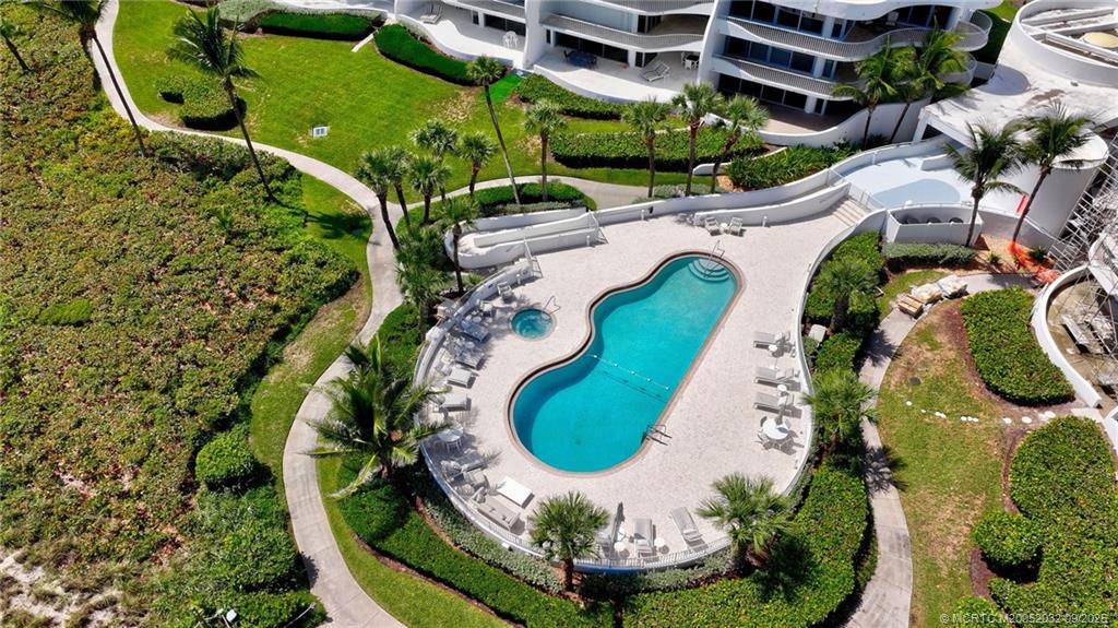 2001 Southeast Sailfish Point Boulevard, Unit 303 Stuart, FL 34996 - Photo 45 of 63 an aerial view of a swimming pool