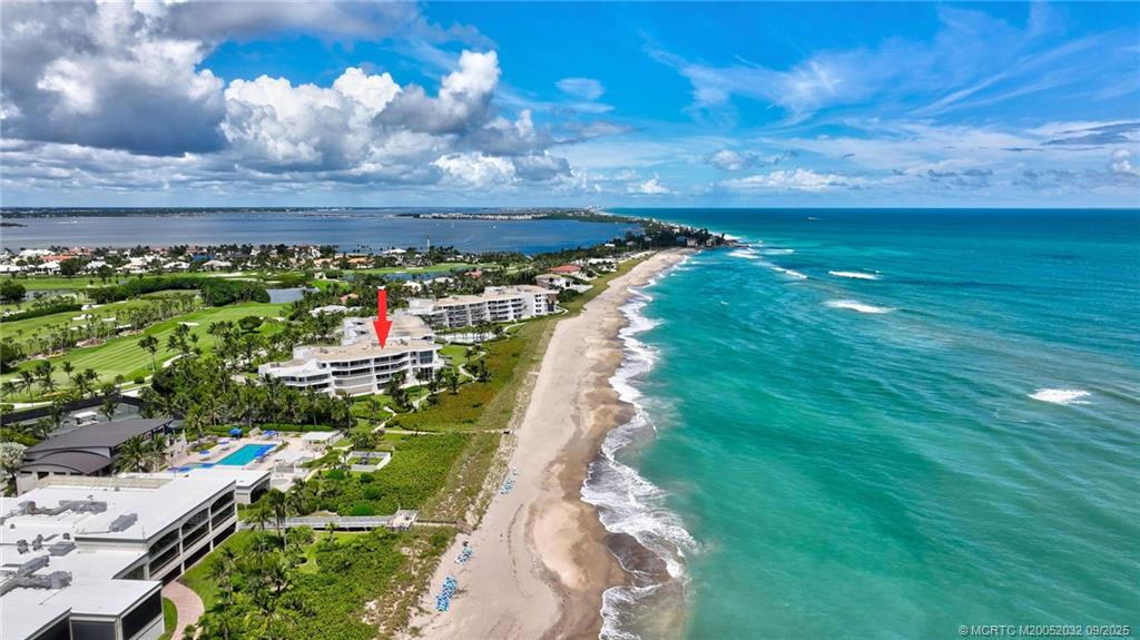 2001 Southeast Sailfish Point Boulevard, Unit 303 Stuart, FL 34996 - Photo 49 of 63 a view of a garden with an outdoor space