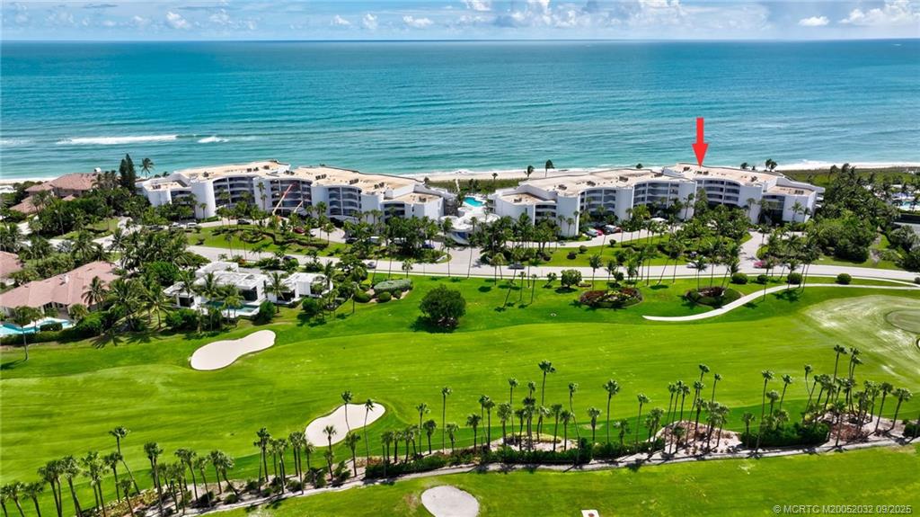 2001 Southeast Sailfish Point Boulevard, Unit 303 Stuart, FL 34996 - Photo 51 of 63 a view of a golf course with chairs