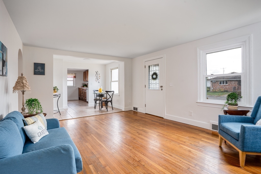 142 Amherst Street Ludlow, MA 01056 - Photo 13 of 34 a living room with furniture and wooden floor