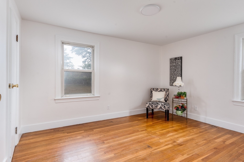 142 Amherst Street Ludlow, MA 01056 - Photo 14 of 34 a room with furniture and a window