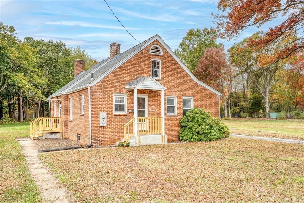 142 Amherst Street Ludlow, MA 01056 - Photo 3 of 34 a view of a house with a yard