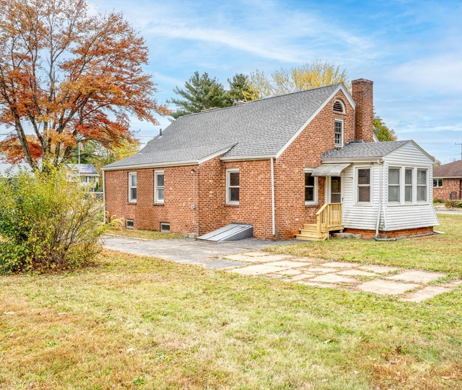 142 Amherst Street Ludlow, MA 01056 - Photo 4 of 34 a view of a yard in front of a house