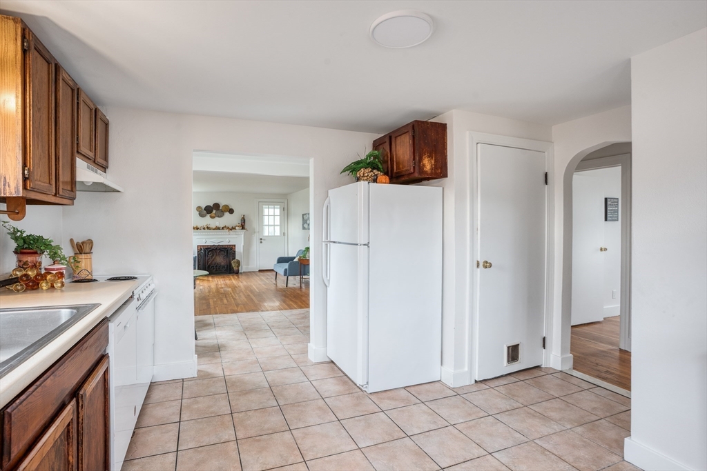 142 Amherst Street Ludlow, MA 01056 - Photo 6 of 34 a kitchen with stainless steel appliances a refrigerator and a sink